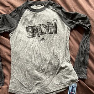 Brooklyn Nets girls long-sleeve T-shirt.